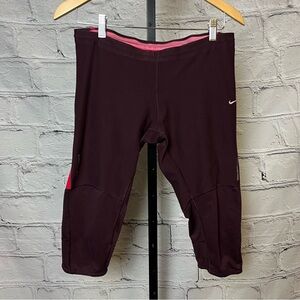 NIKE Dri Fit Capri workout pants. Maroon and salmon color